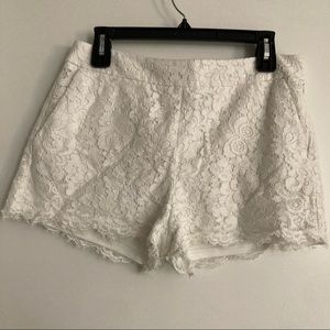 White lace shorts.  Express 8. Pockets. Side zipper.